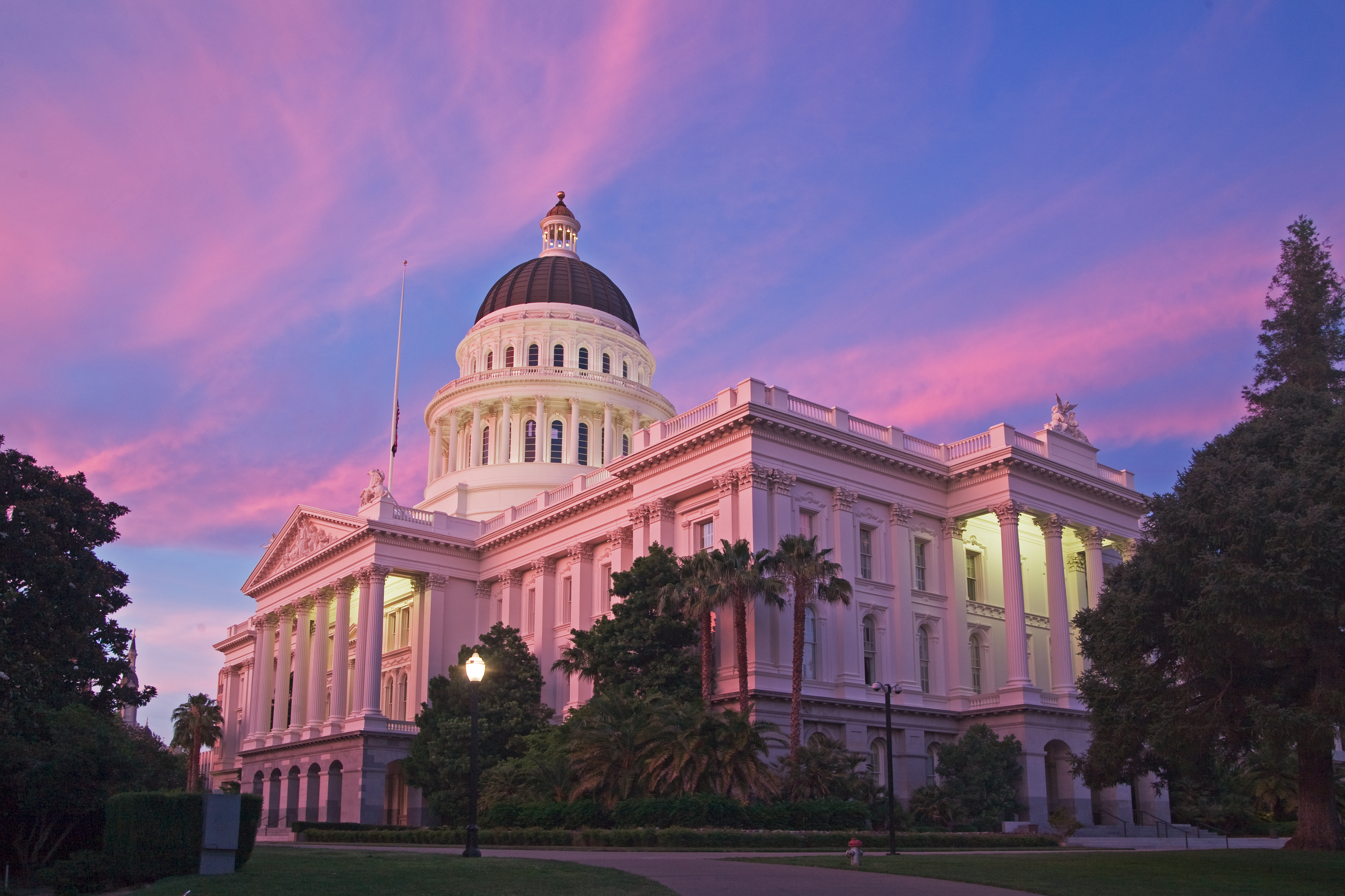 Image of California State Capitol with purple and  blue sky